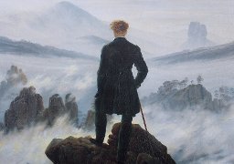 man_standing_on_mountain_256x180